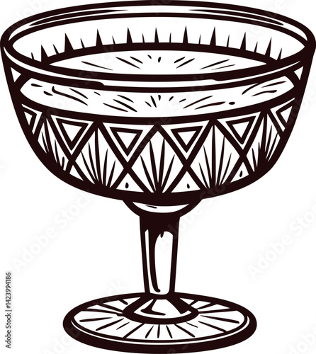 Vintage etched crystal goblet with intricate geometric patterns in black and white design.