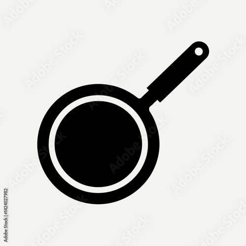 Black Frying Pan Icon: Simple Cooking Utensil Illustration
