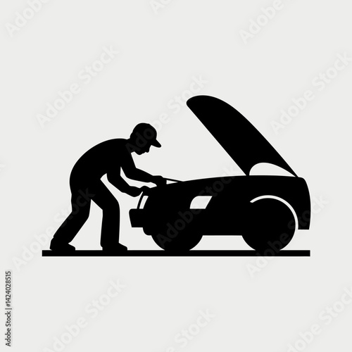 Silhouette of Car Mechanic Repairing Car Engine with Hood Open