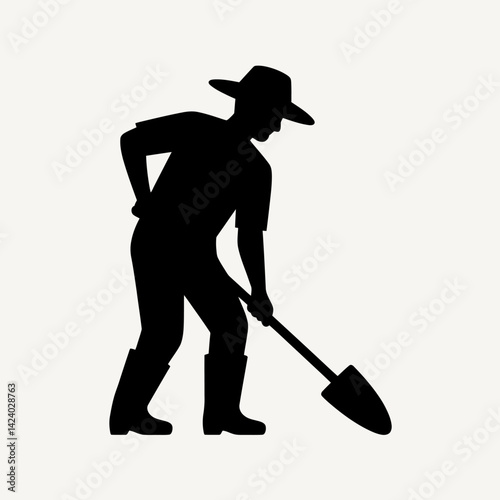 Silhouette of a Farmer Digging Soil with Shovel
