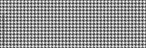 Classic houndstooth pattern in monochrome.  A timeless textile design perfect for backgrounds, website templates, fashion, or print projects.