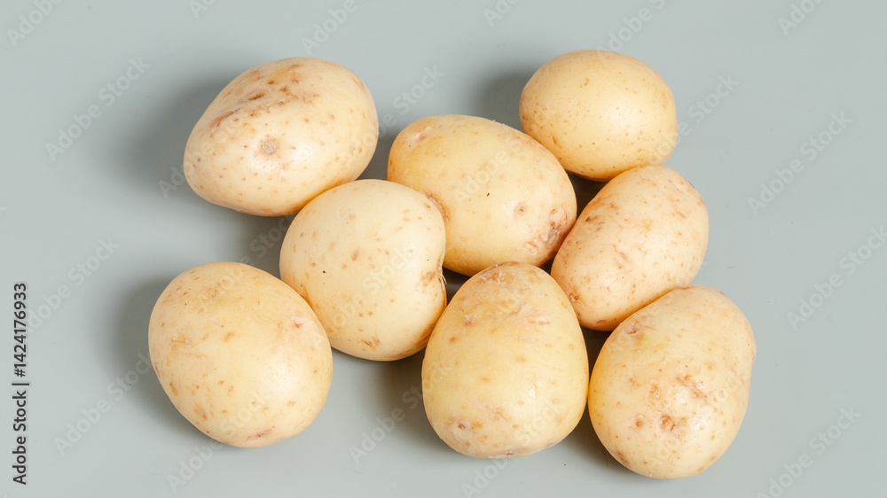 Potatoes isolated on grey background Potatoes isolated on grey background