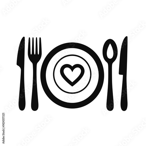 Cutlery arranged around a plate with heart symbol  