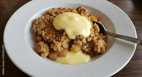 Apple Crumble Served With Creamy Custard Dessert On A Plate