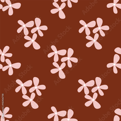 Vintage seamless floral pattern. Liberty style background of small mauve and lilac flowers. Small flowers scattered over a white background. Stock for printing on surfaces