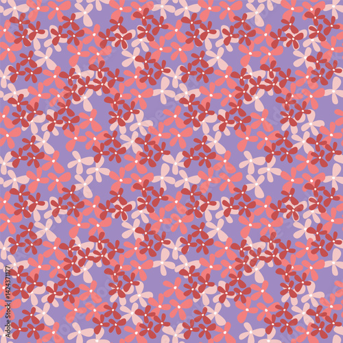 Vintage seamless floral pattern. Liberty style background of small mauve and lilac flowers. Small flowers scattered over a white background. Stock for printing on surfaces