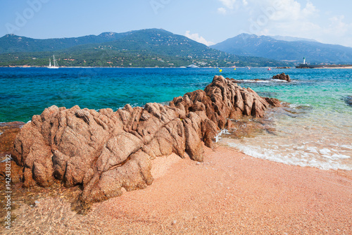 Obraz na płótnie Scenic view of a rugged rocky shoreline beside crystal-clear waters. Corsica w salonie