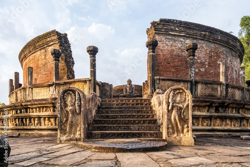 Polonnaruwa Vatadage, a circular shrine with intricate stonework, moonstones, and stupa in the Ancient City of Polonnaruwa, Sri Lanka, showcasing ancient architecture.