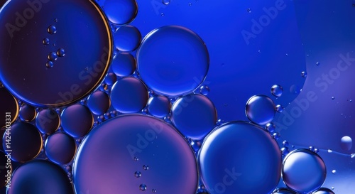 Vibrant blue and purple oil bubbles on surface