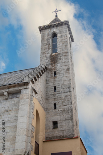 Granite stone tower of the Church of Santa Isabel in La Granja de San Ildefondo, province of Segovia, Spain