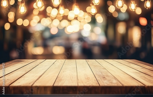 Obraz na płótnie Wooden table top with warm, bokeh lights w salonie