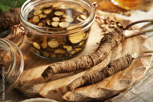 Tableau sur toile Preparation of burdock root tincture. Herbal medicine.