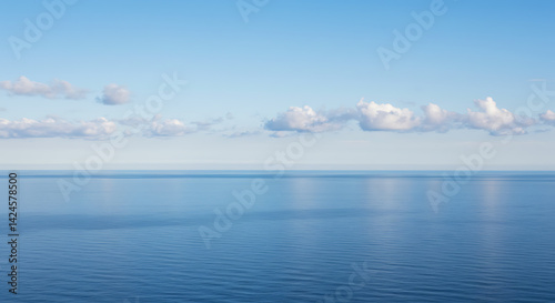 Wallpaper Mural Tranquil Seascape: Calm Blue Ocean Horizon Under Peaceful Sky with Minimal Clouds Torontodigital.ca