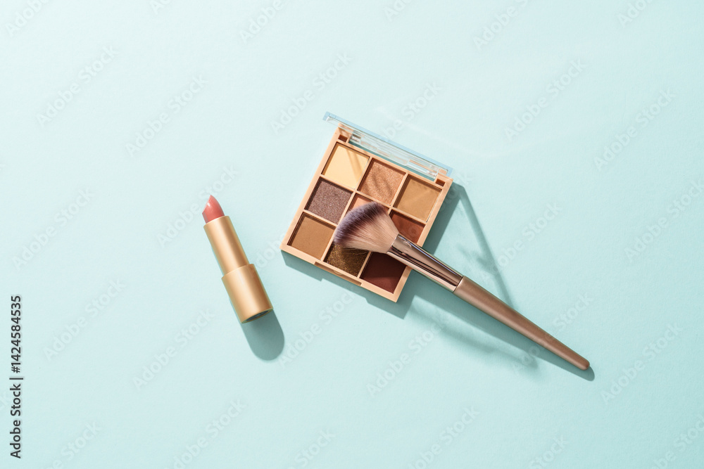 Make up products on blue background.