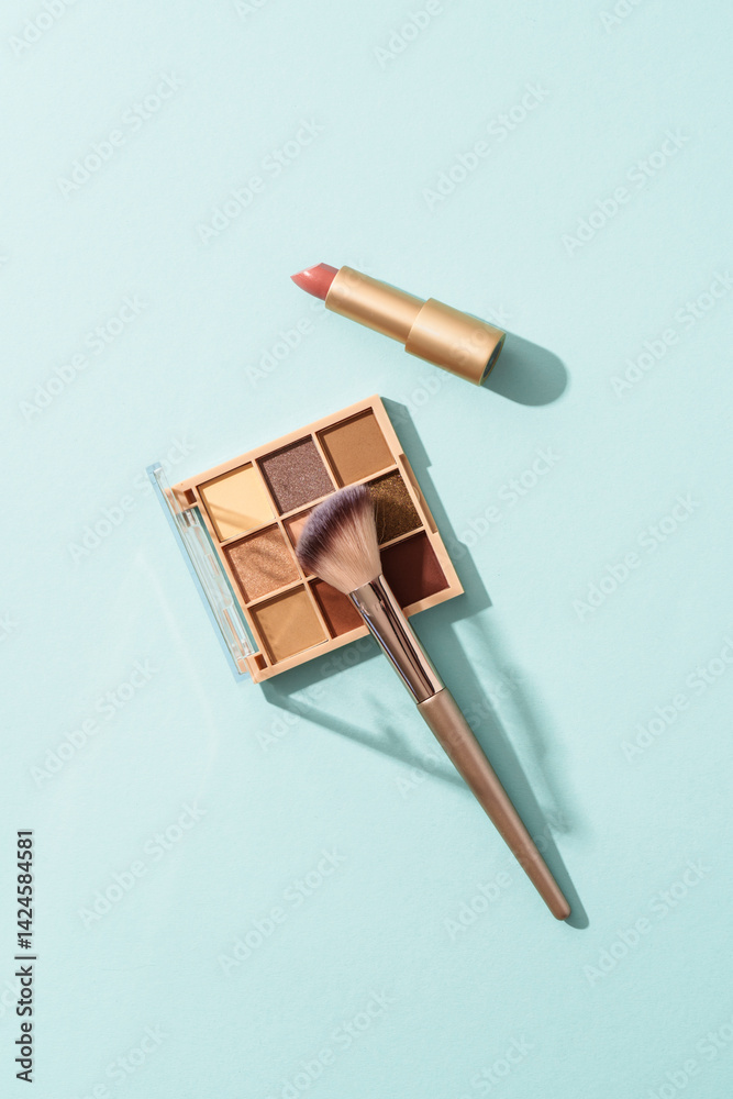 Make up products on blue background.