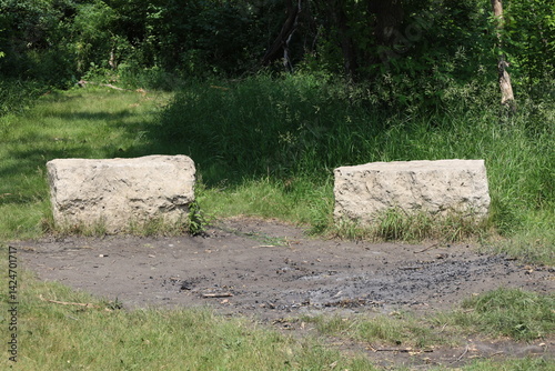 quarried limestone blocks serve as benches beside fire pit for Native Aboriginal Indigenous events ceremonies