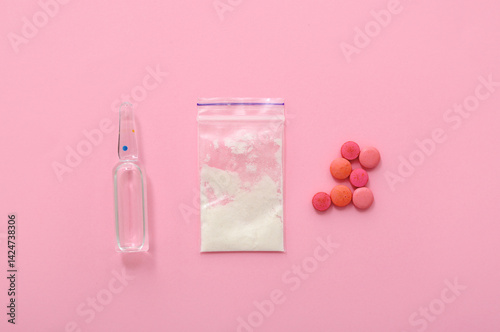 Different drugs on pink bac...