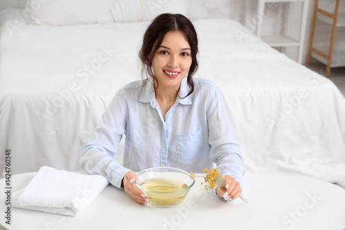 Young Asian woman preparing...