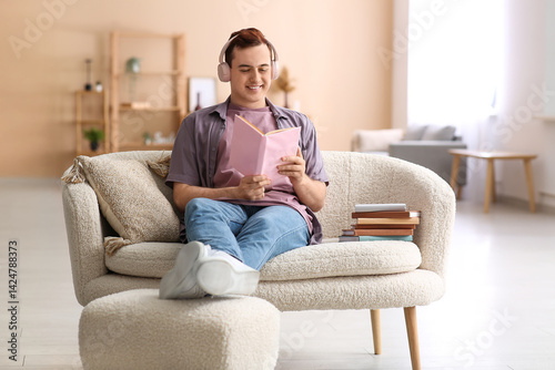 Young man listening music a...