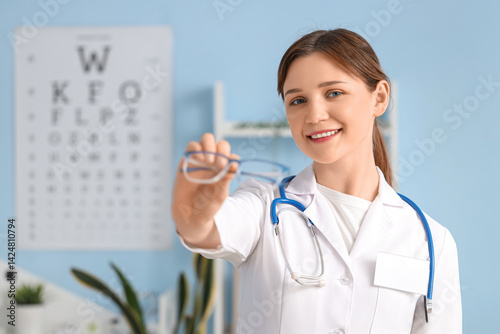 Female ophthalmologist with...