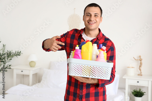 Young man with cleaning sup...