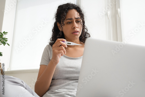 Sick African-American woman...