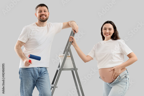 Young pregnant couple with ...