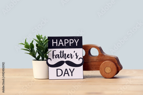 Card with text HAPPY FATHER...