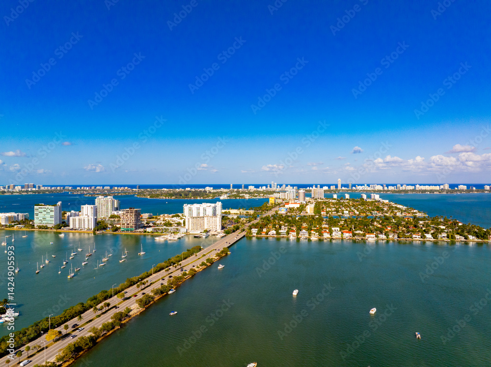 Obraz premium Aerial photo of Miami North Bay Village. Image shows 79th Street bridge and both residential homes and condominiums on several islands