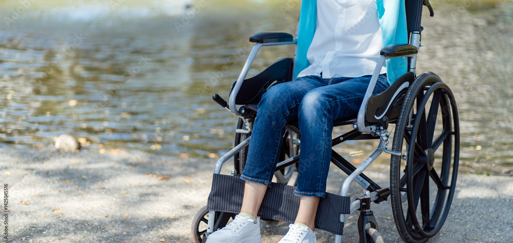 Obraz premium Depressed sad asian woman in wheelchair&nbsp;lonely disabled adult