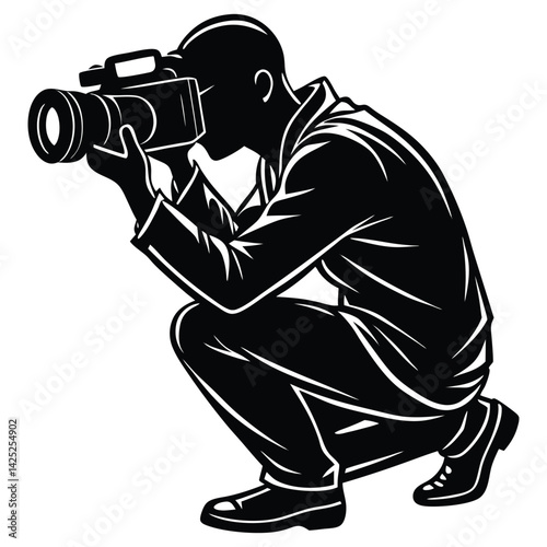 Silhouette of a photographer holding a camera in a dramatic pose