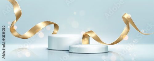 Gold ribbon streamers and round podiums on light blue background. Curved shiny satin stripes around cylinder pedestals. Luxury glossy foil swirls and sparkly decoration elements for product display.