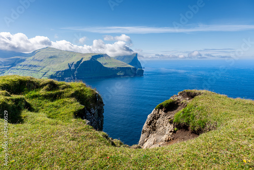 View of Eidiskollur mountain cliff and Eidi camping, Faroe islands