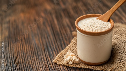 Nutritional Yeast Granules in Ceramic Bowl on Wooden Background