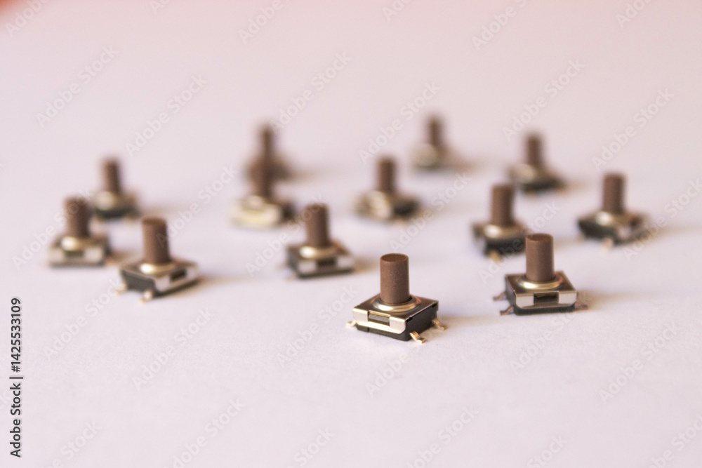 Brown Tactile Switches on White Background Brown Tactile Switches on White Background
