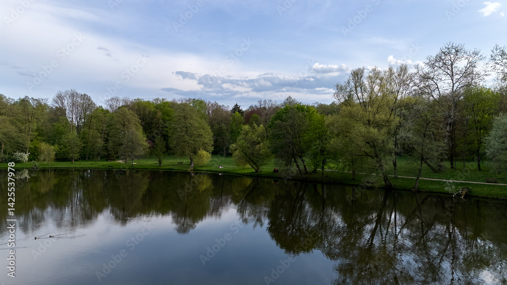 Lake with trees and a pond in the background Lake with trees and a pond in the background