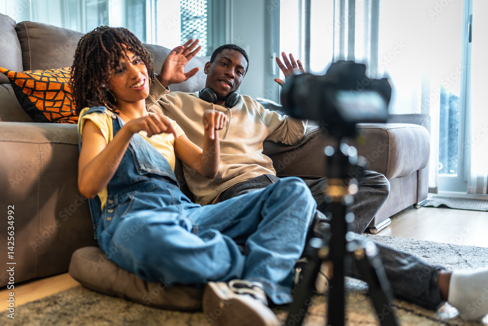 Content creators filming video blog at home