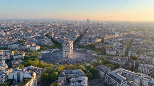 Aerial view of Mesmerizing Aerial View of Paris Featuring the Arc de Triomphe at Beautiful Sunrise Hours. France
