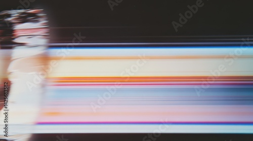 Dynamic interplay of colors and light evokes a sense of nostalgia with a vintage film effect