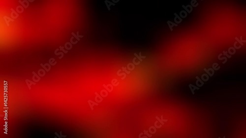 Blurry red and black abstract background suitable for modern designs, web graphics, brochures, and artistic projects needing a dynamic backdrop.