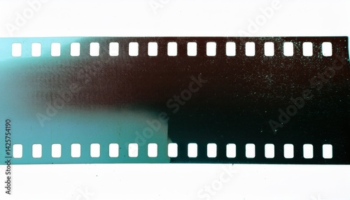  vintage 35mm film strip close-up with sprocket holes and blank frames for retro design, print media, or branding background texture use