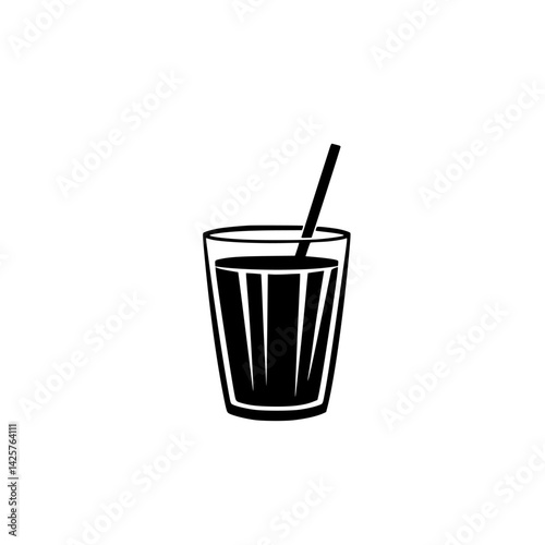 Refreshing black drink in a clear glass with a straw on a white background captured at a modern eatery