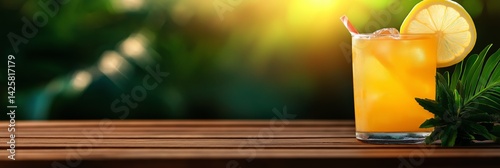Obraz na płótnie Glass of lemonade on wooden table against blurred green summer background. Concept of refreshing drink, summer relaxation, healthy lifestyle, and natural outdoor enjoyment. w salonie