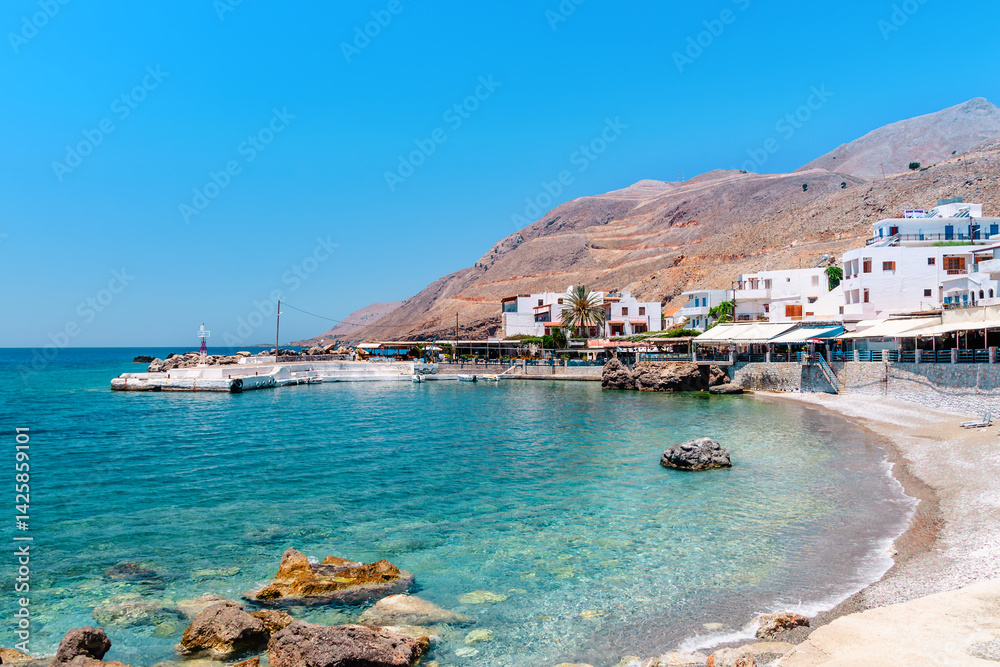 Beautiful coastal view of white buildings along a serene bay