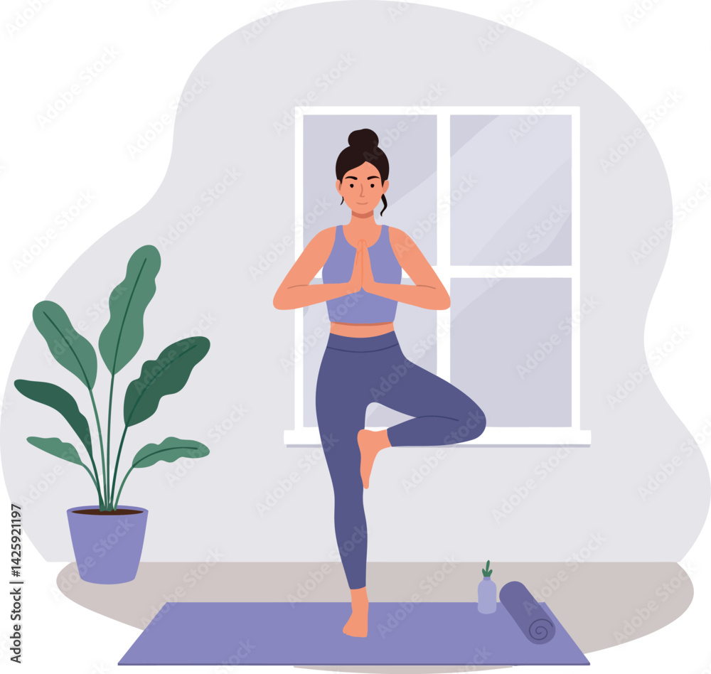 Fototapeta premium Woman practicing yoga indoors in tree pose on purple mat near plant and window 