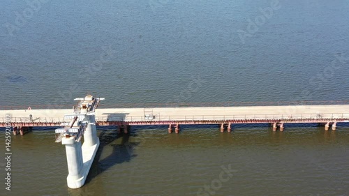 Construction of an automobile bridge across the river. View from above