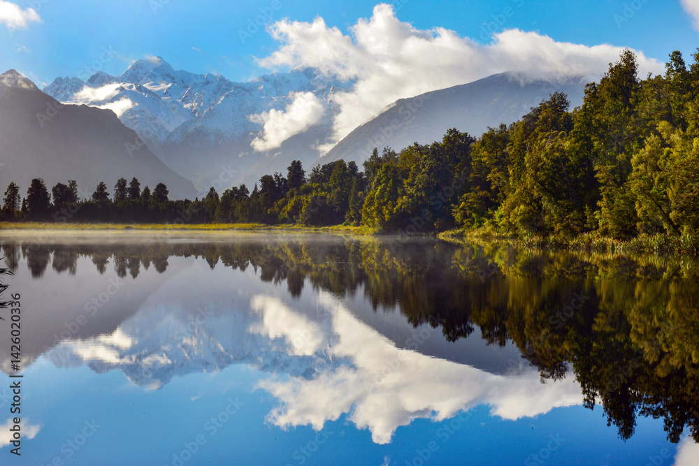 Naklejka premium Lake matheson is a small lake in south westland, new zealand