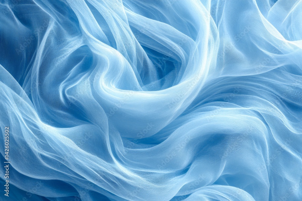 Obraz premium Soft blue fabric undulating in gentle waves creating a tranquil and airy atmosphere in an artistic display