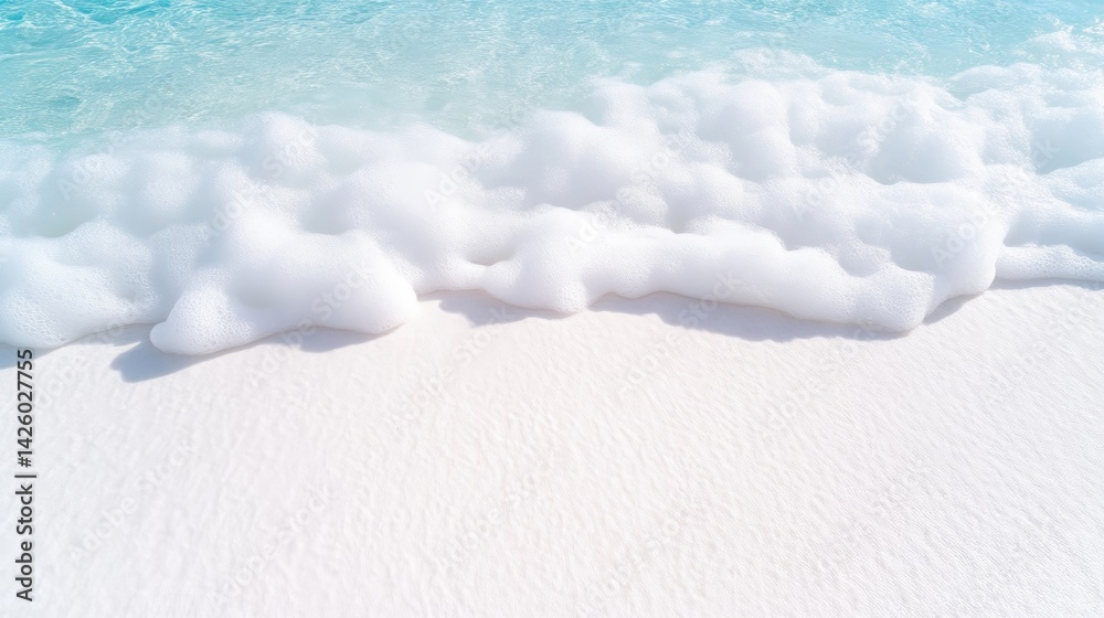 Fototapeta premium Soft waves gently lapping on pristine white sand