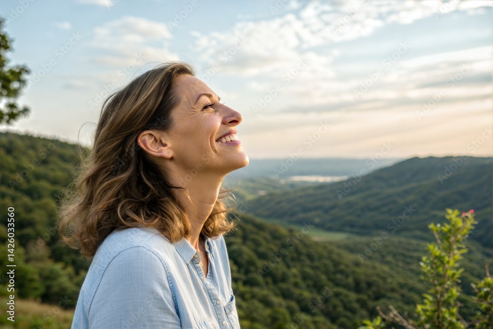 Happy woman enjoying nature, deep in thought with a positive mindset. Smiling, feeling inspired and relaxed in a peaceful outdoor environment. (People) Happy woman enjoying nature, deep in thought with a positive mindset. Smiling, feeling inspired and relaxed in a peaceful outdoor environment. (People)